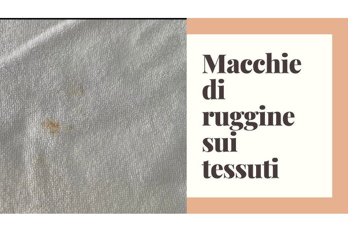 Rimozione della ruggine da un capo di abbigliamento con un prodotto specifico.
