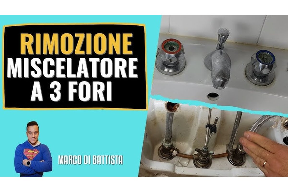 Lavabo con aloni rossi e rubinetto in bagno moderno.